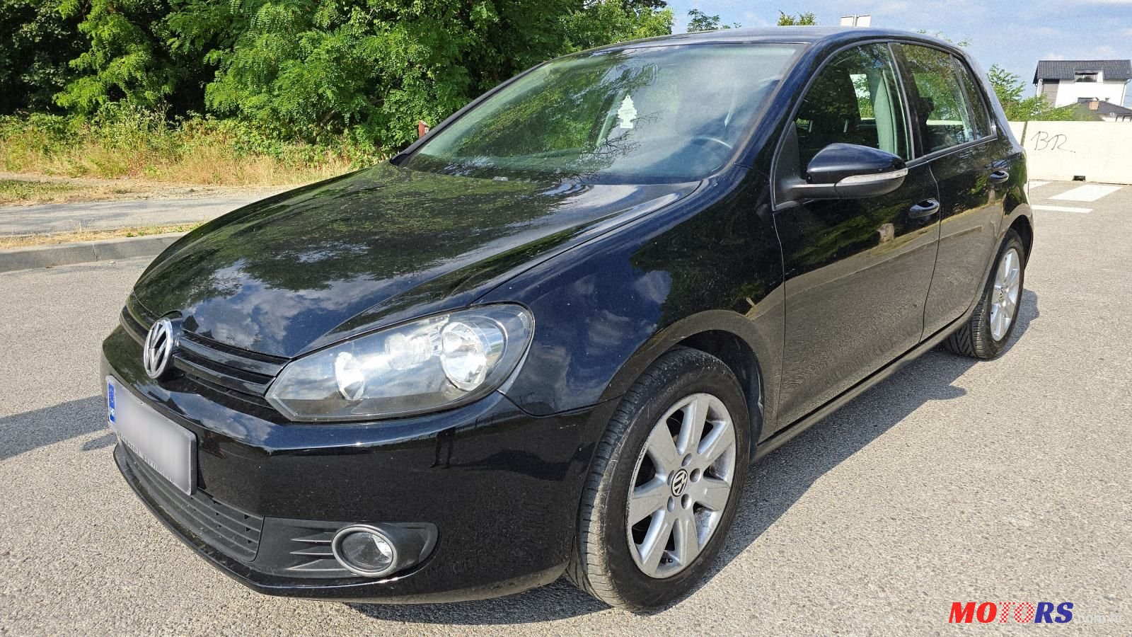 2010' Volkswagen Golf VI 1,6 Tdi photo #2