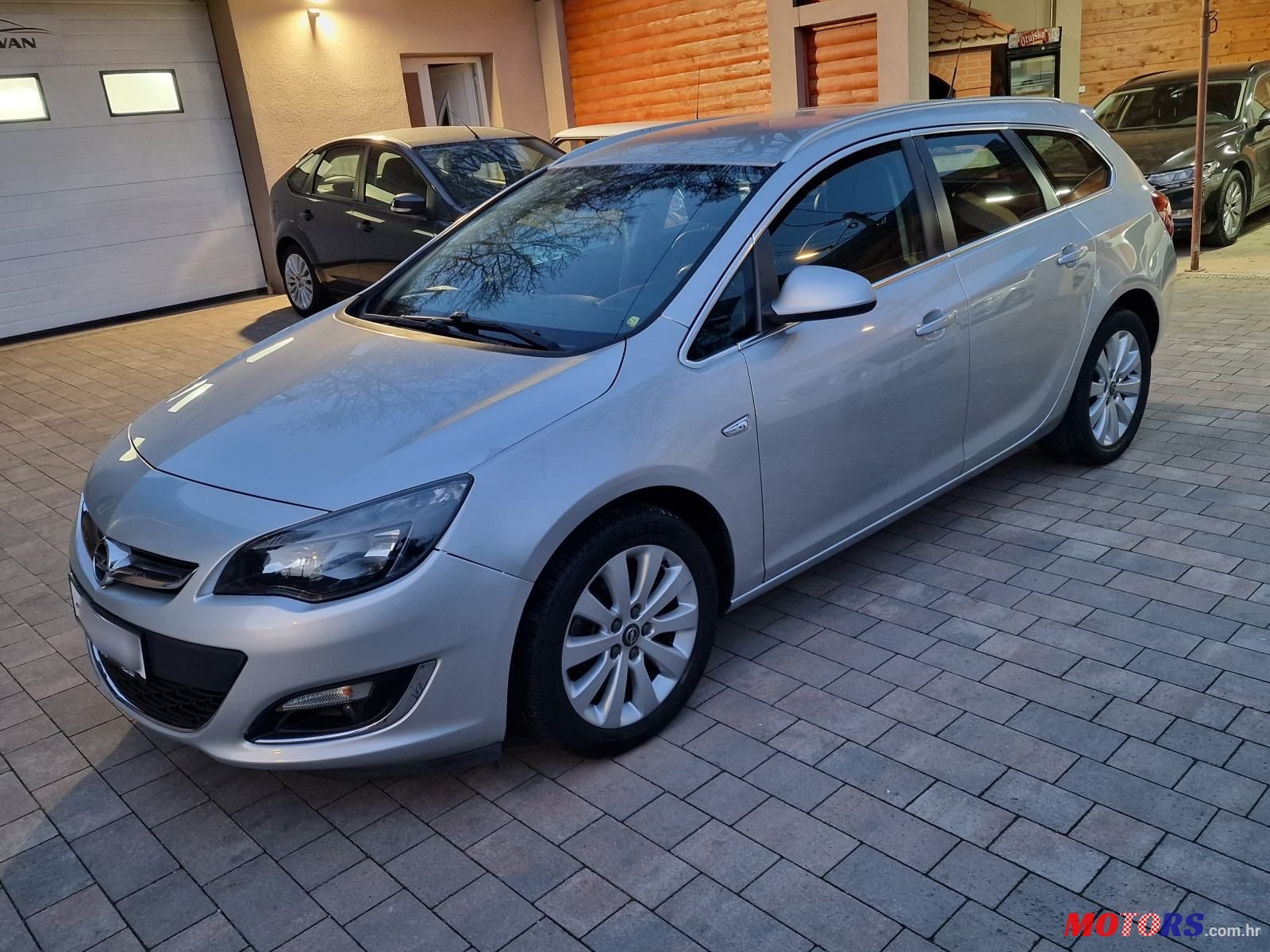 2014' Opel Astra Karavan photo #2