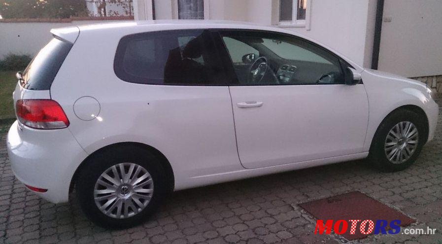 2011' Volkswagen Golf VI 1,6 Tdi photo #1