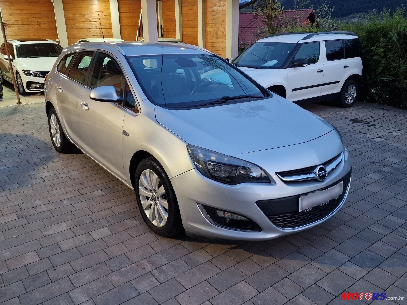 2014' Opel Astra Karavan photo #4