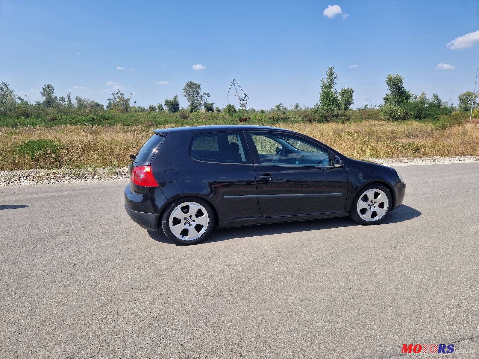 2004' Volkswagen Golf V 1,4 photo #4