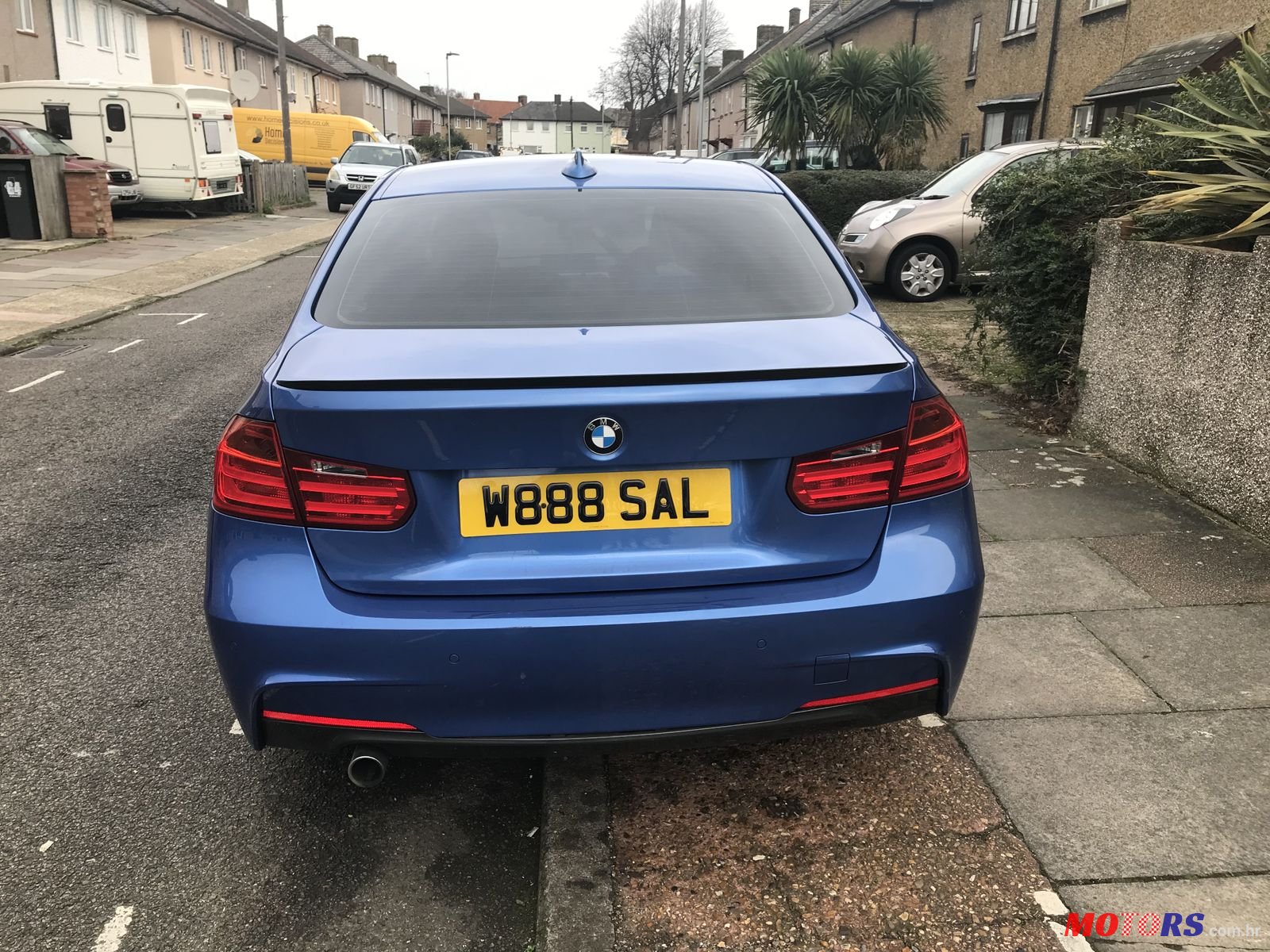 2012' BMW 3 Series M Sport with M3 wings photo #4