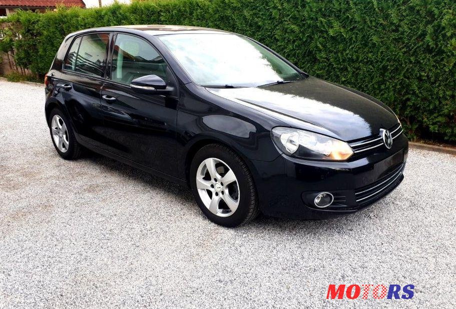 2011' Volkswagen Golf VI 1,6 Tdi photo #1