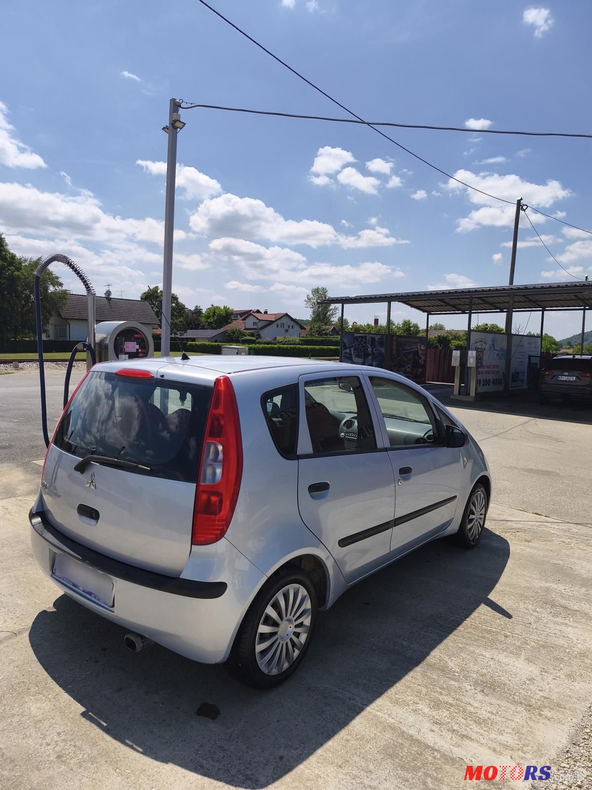 2004' Mitsubishi Colt 1,3 photo #4