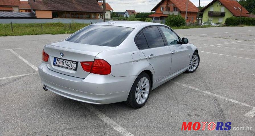 2009' BMW 3 Series 320D photo #1