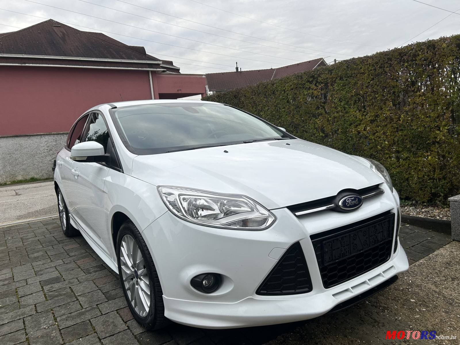 2013' Ford Focus 1,0 Sport photo #1