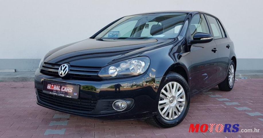 2011' Volkswagen Golf VI 1,6 Tdi photo #1