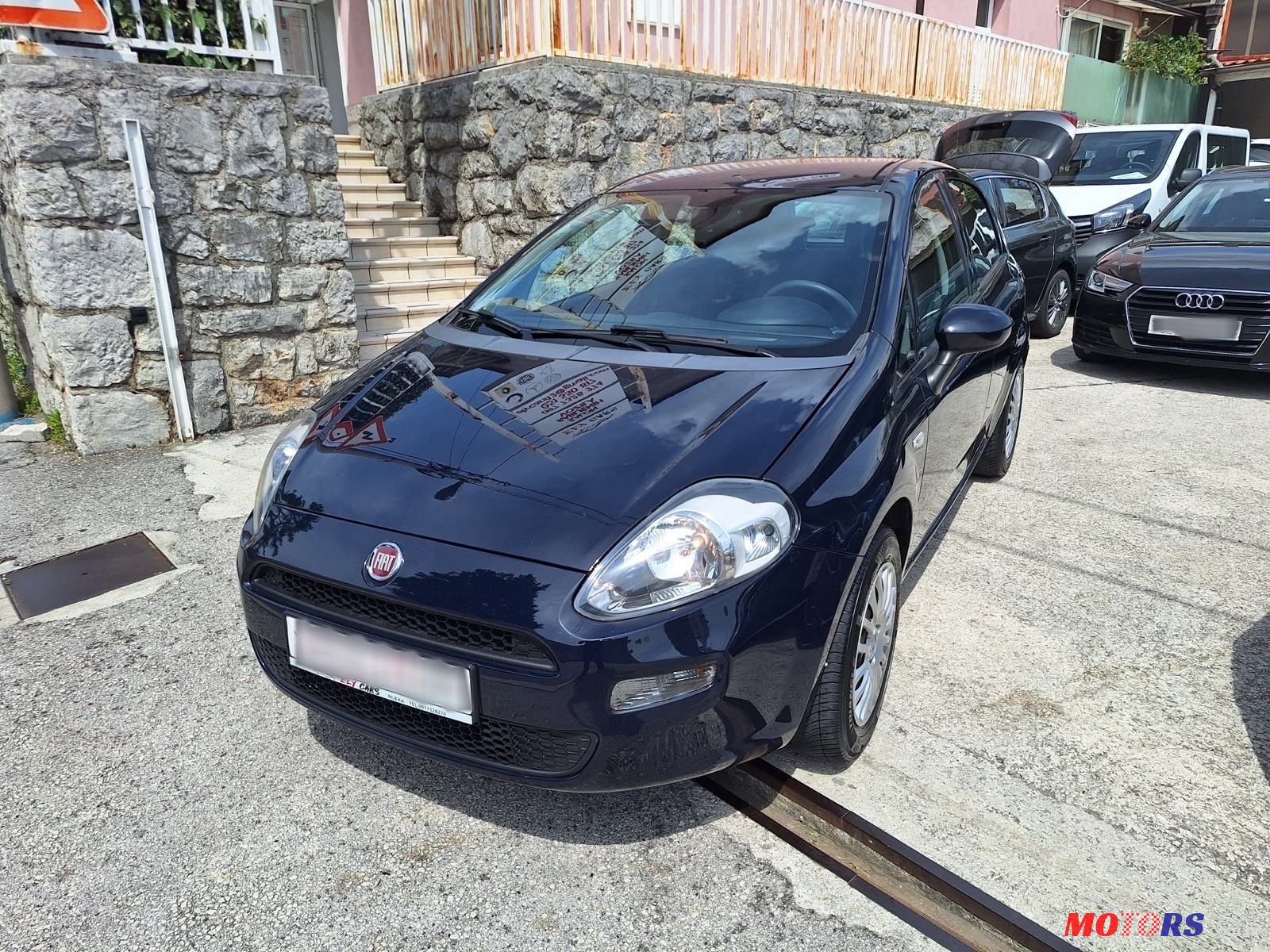 2015' Fiat Punto Evo 1.4 photo #1