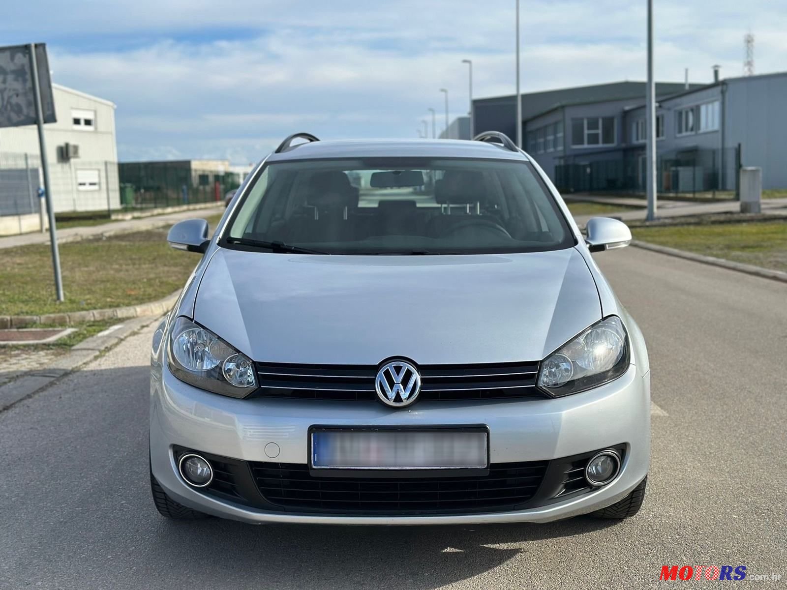 2011' Volkswagen Golf VI Variant photo #3