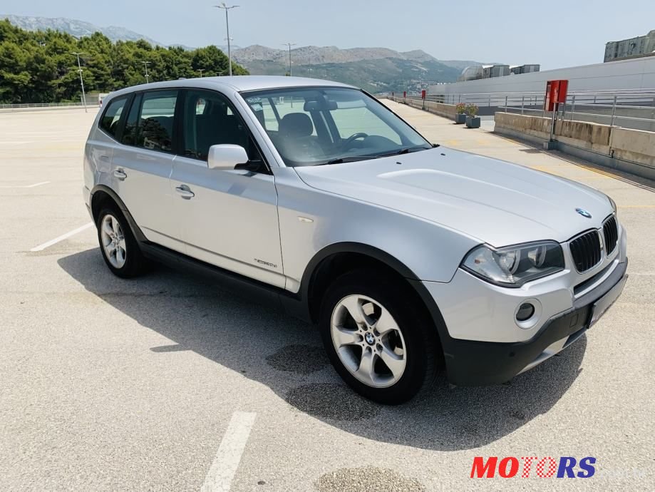 2009' BMW X3 Xdrive20D photo #1