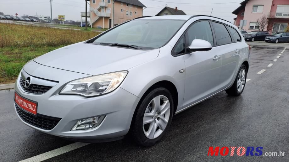 2011' Opel Astra Karavan photo #1