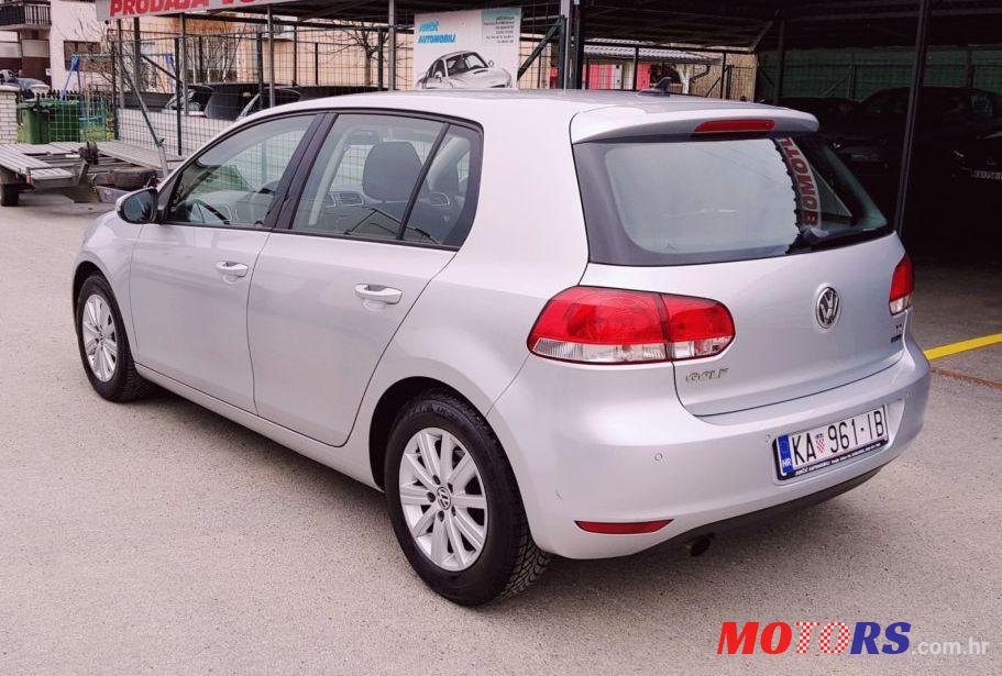 2012' Volkswagen Golf VI 1,6 Tdi photo #2
