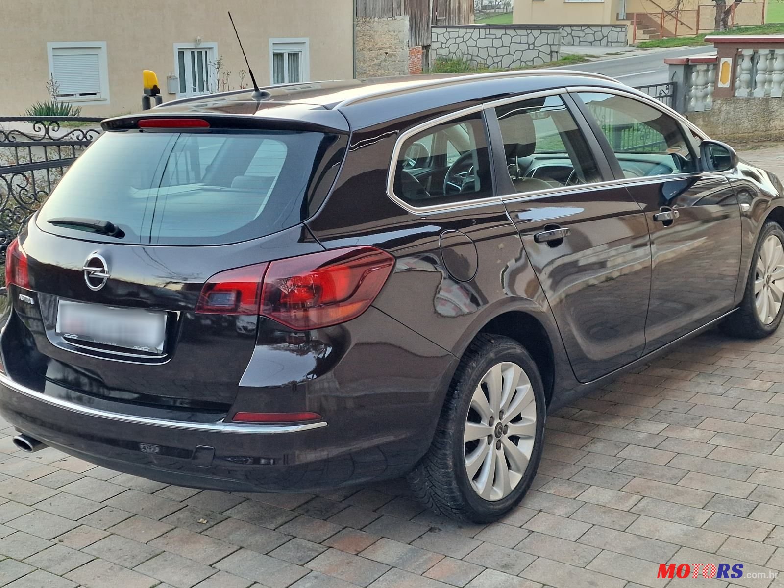 2014' Opel Astra Karavan photo #2