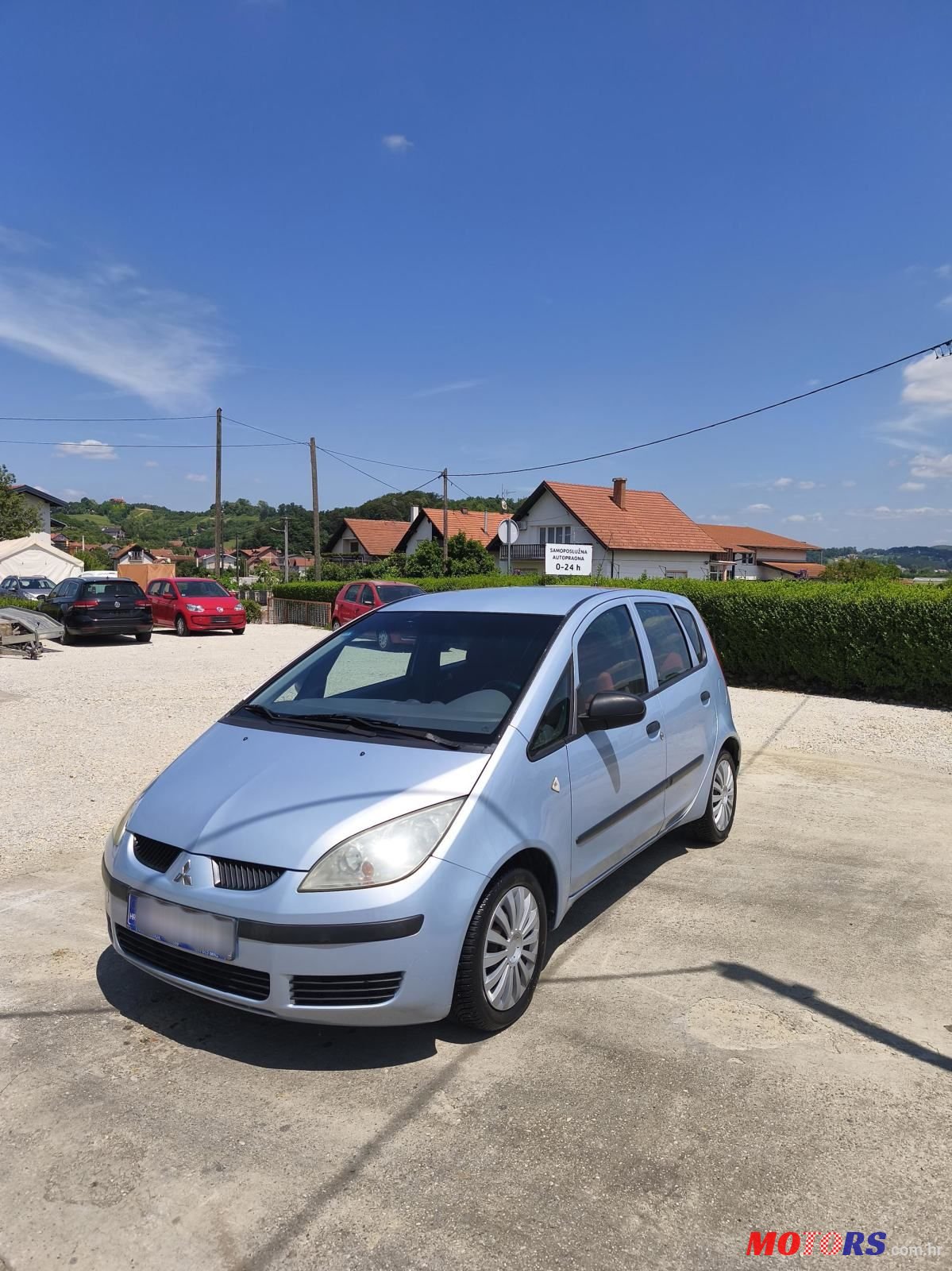 2004' Mitsubishi Colt 1,3 photo #1