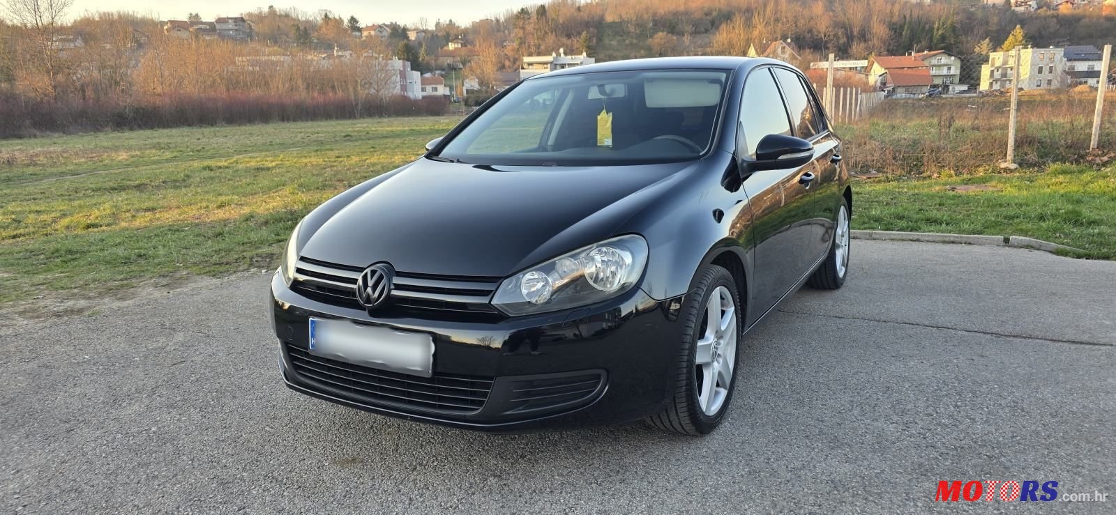 2009' Volkswagen Golf VI 1,6 photo #5