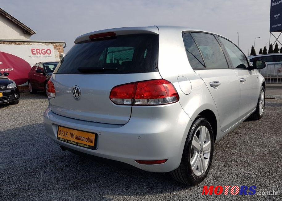 2012' Volkswagen Golf VI 1,6 Tdi photo #2