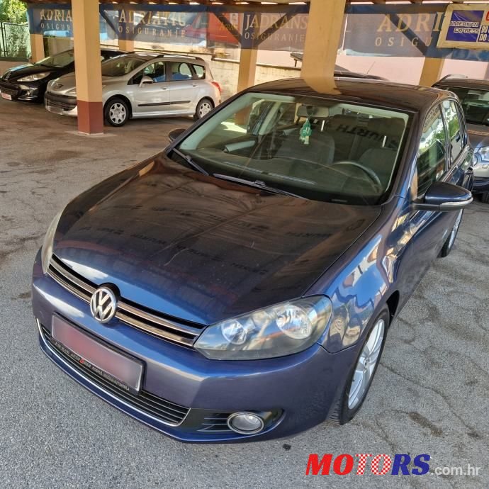 2011' Volkswagen Golf VI 1,6 Tdi photo #3