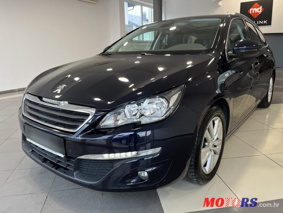 2015' Peugeot 308 Sw photo #1