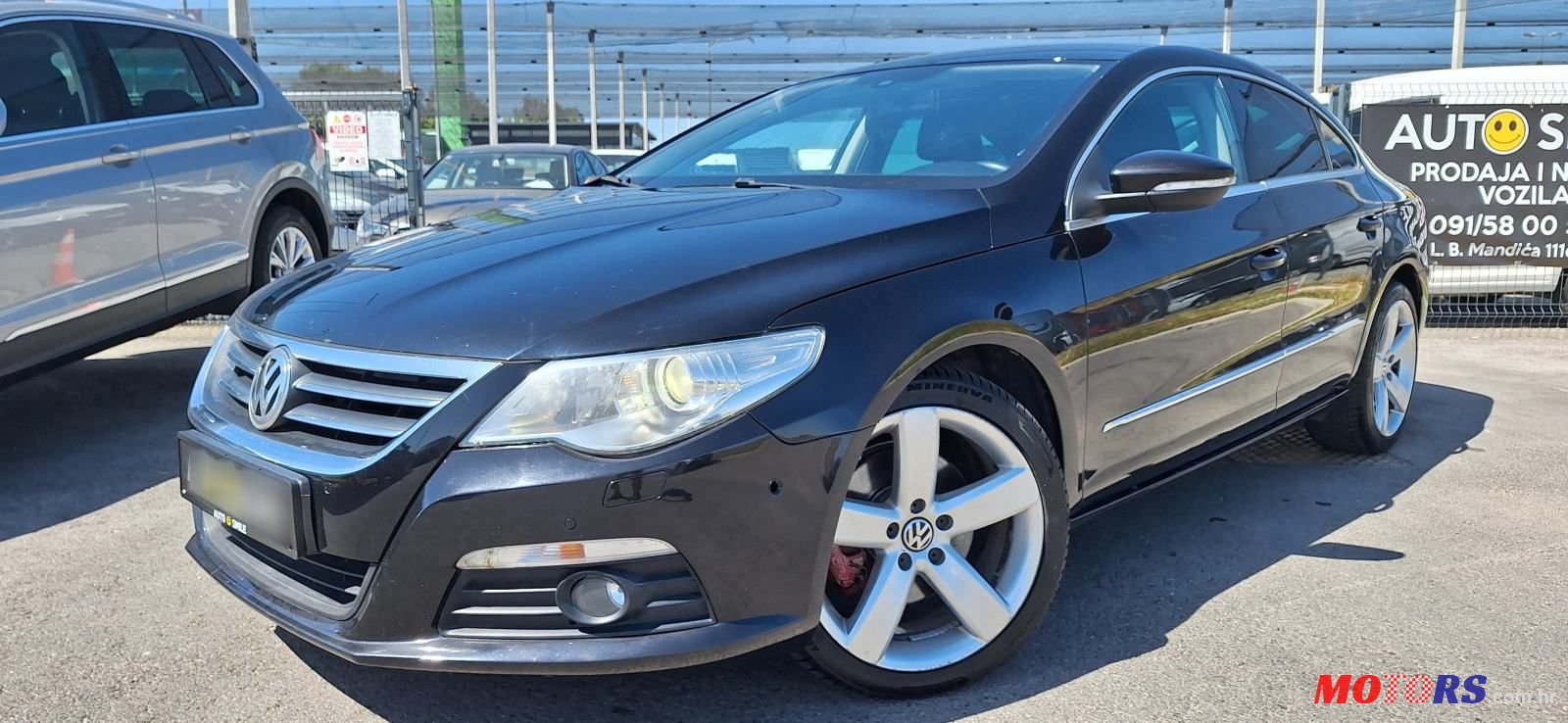 2009' Volkswagen Passat 2,0 Tdi photo #1