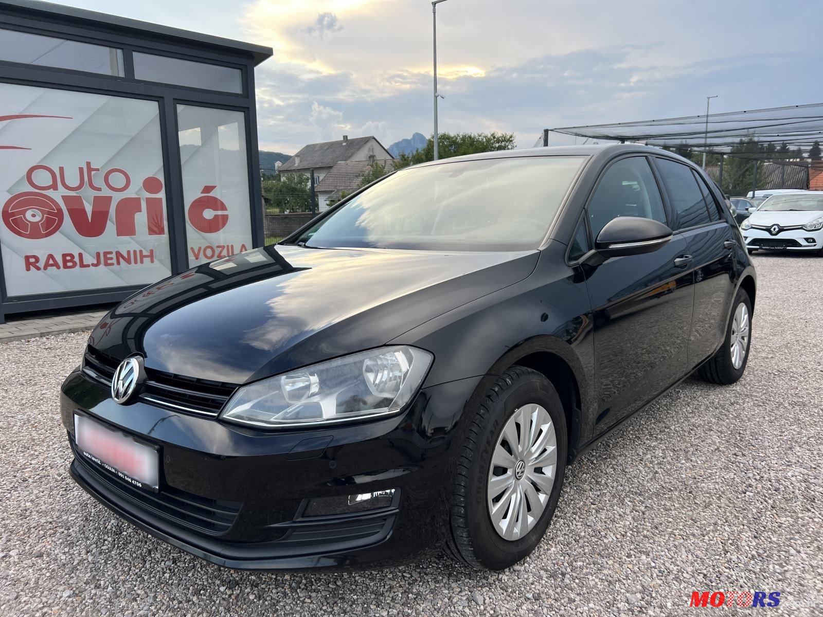 2013' Volkswagen Golf VII 1,6 Tdi Bmt photo #1