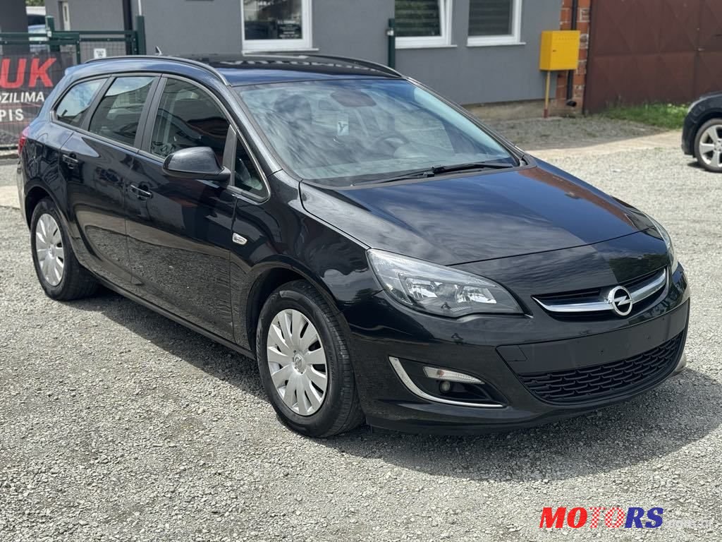 2013' Opel Astra Karavan photo #1