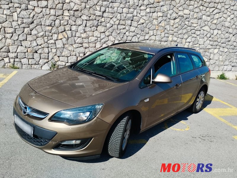 2014' Opel Astra Karavan photo #1