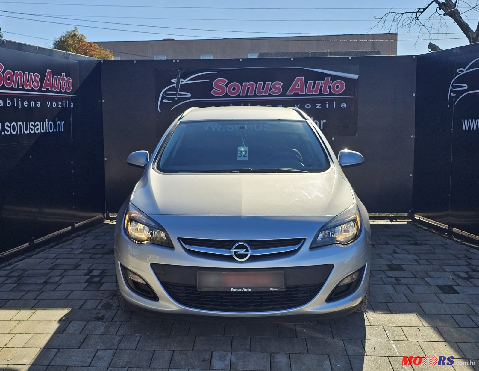 2015' Opel Astra Karavan photo #2