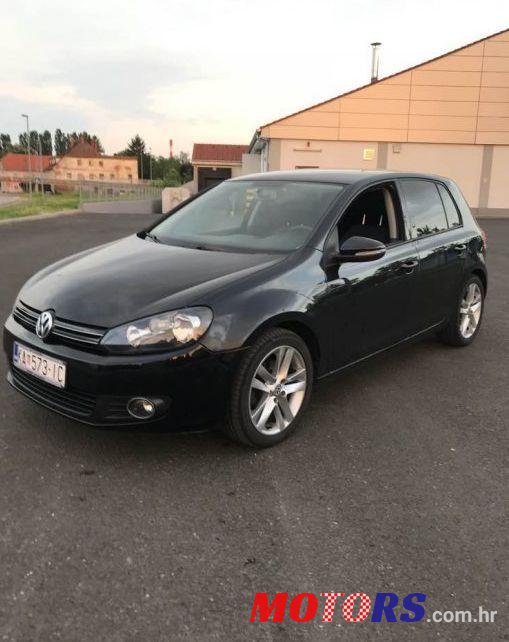 2012' Volkswagen Golf VI 1,6 Tdi photo #1