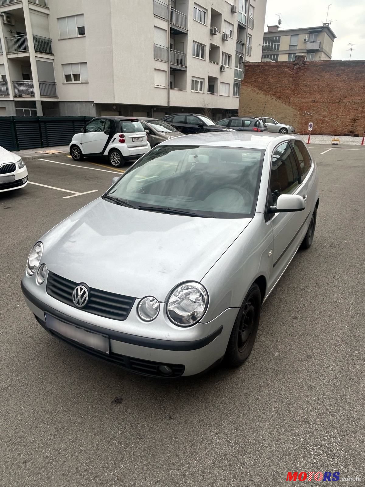 2004' Volkswagen Polo 1,4 photo #1