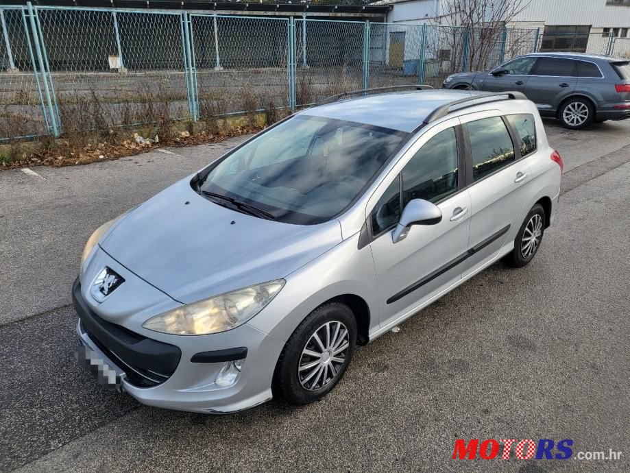 2011' Peugeot 308 Sw photo #1