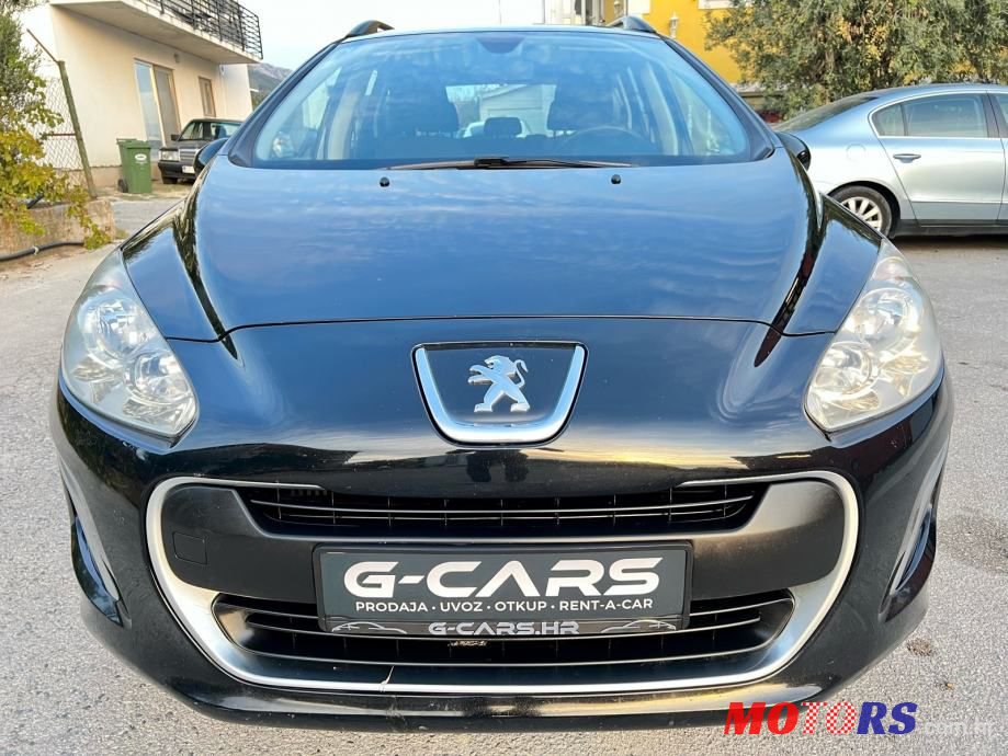 2012' Peugeot 308 Sw photo #2