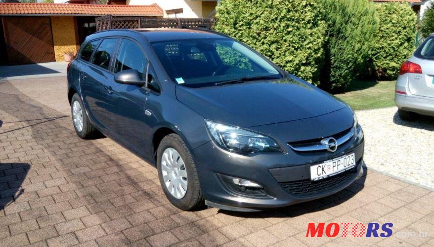 2014' Opel Astra Karavan photo #1