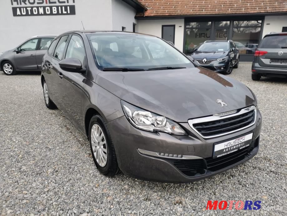 2015' Peugeot 308 Sw photo #1