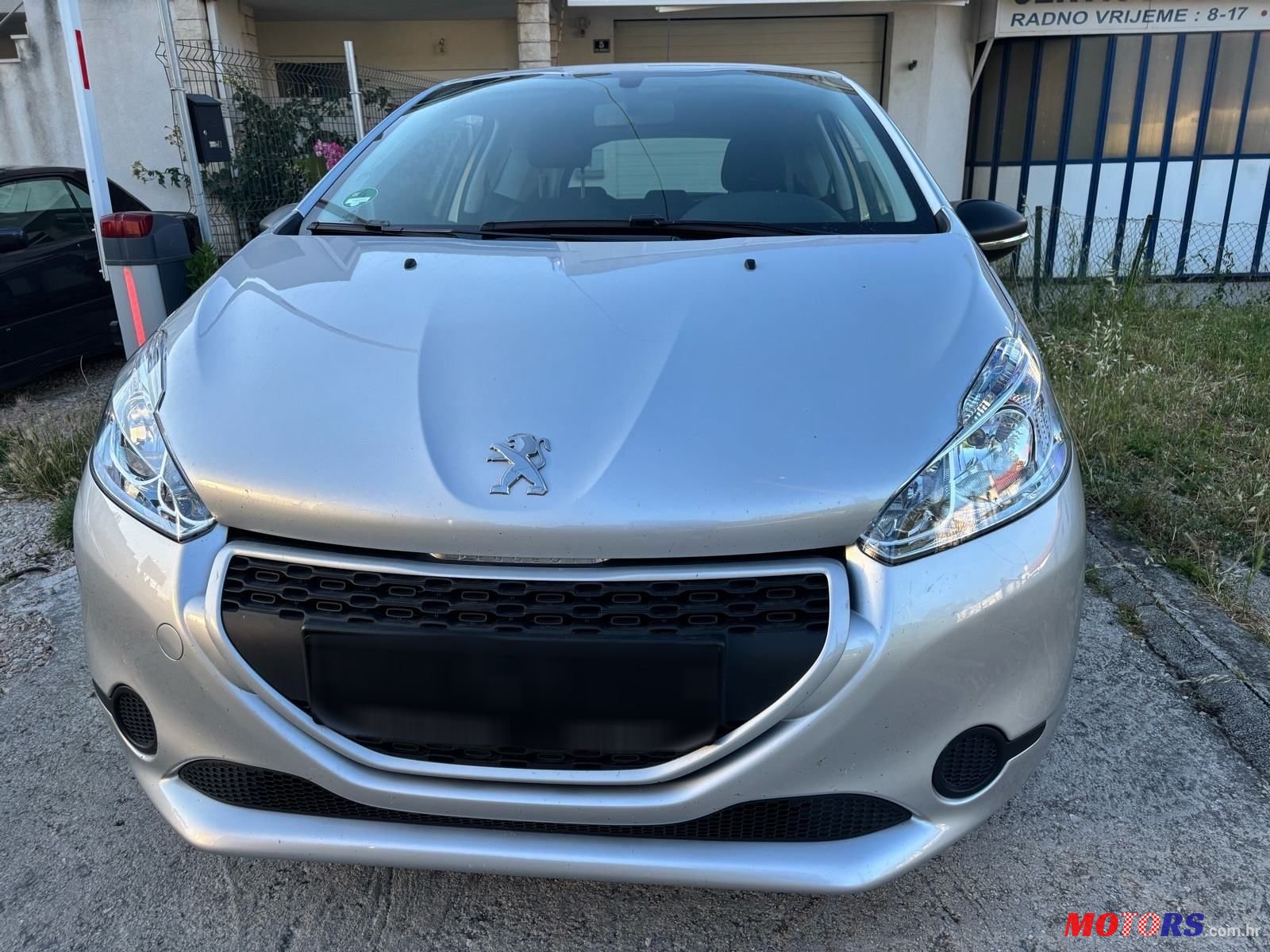 2014' Peugeot 208 1,0 Vti photo #1