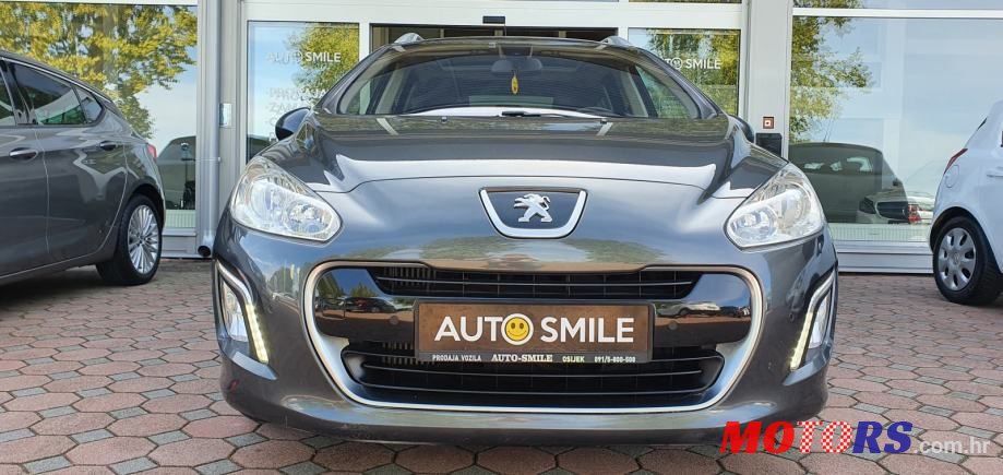 2012' Peugeot 308 Sw photo #3