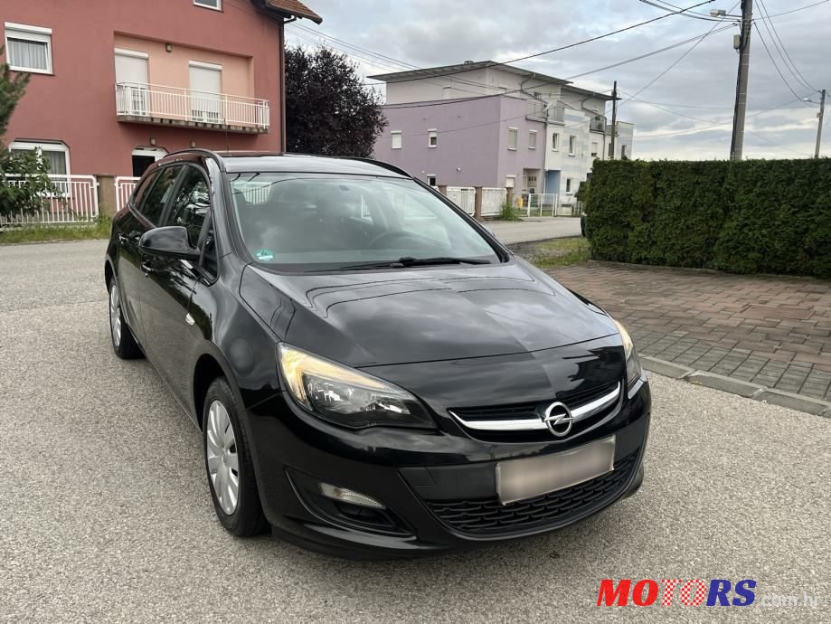 2014' Opel Astra Karavan photo #2