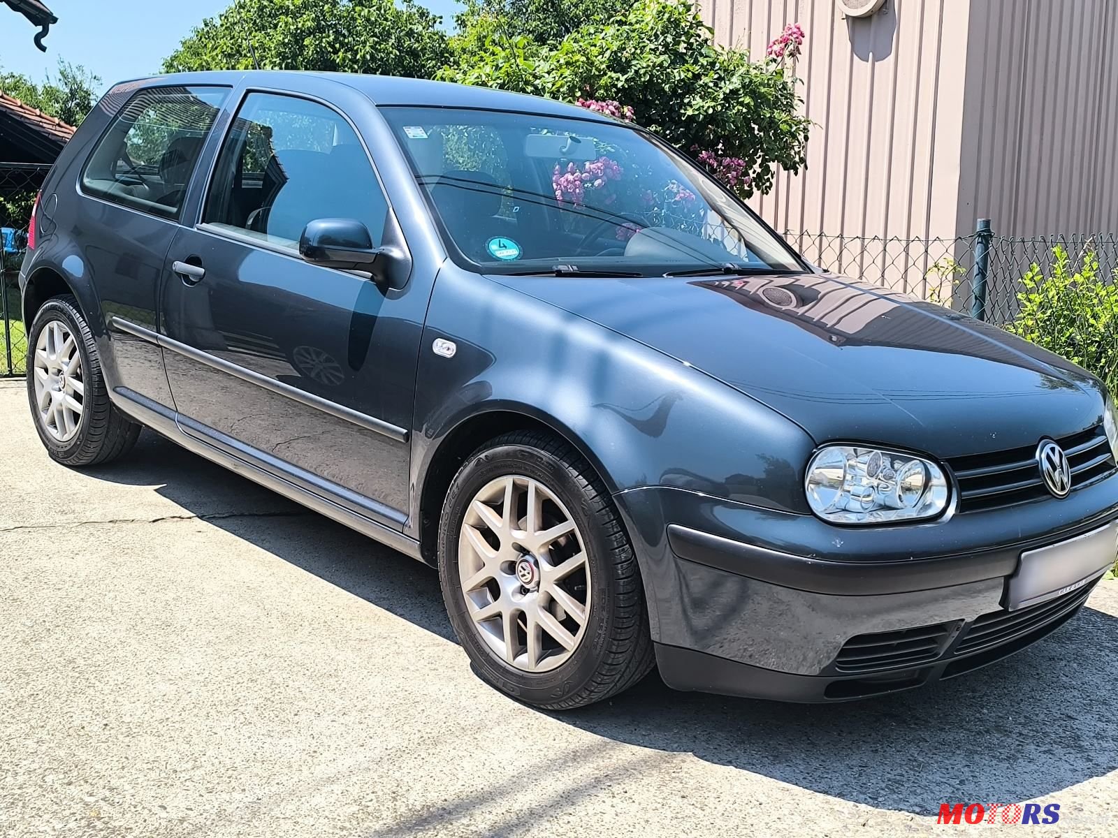 2003' Volkswagen Golf IV 1,4 photo #2
