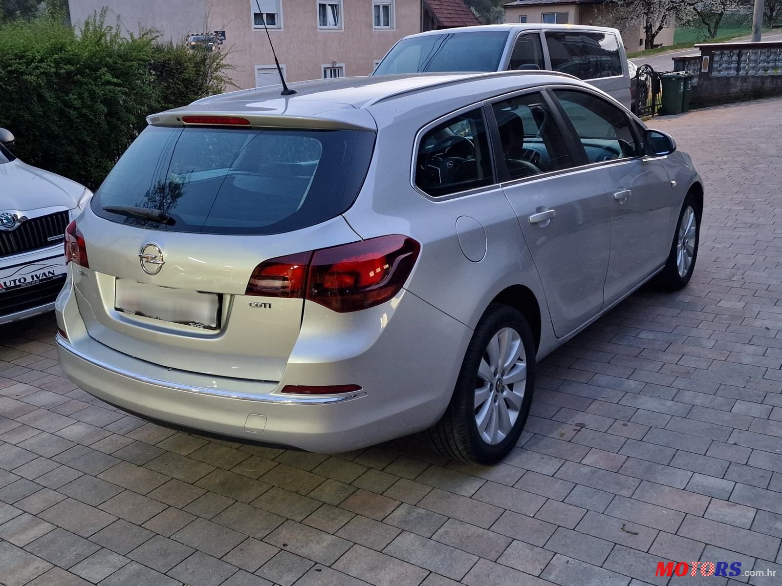 2014' Opel Astra Karavan photo #5