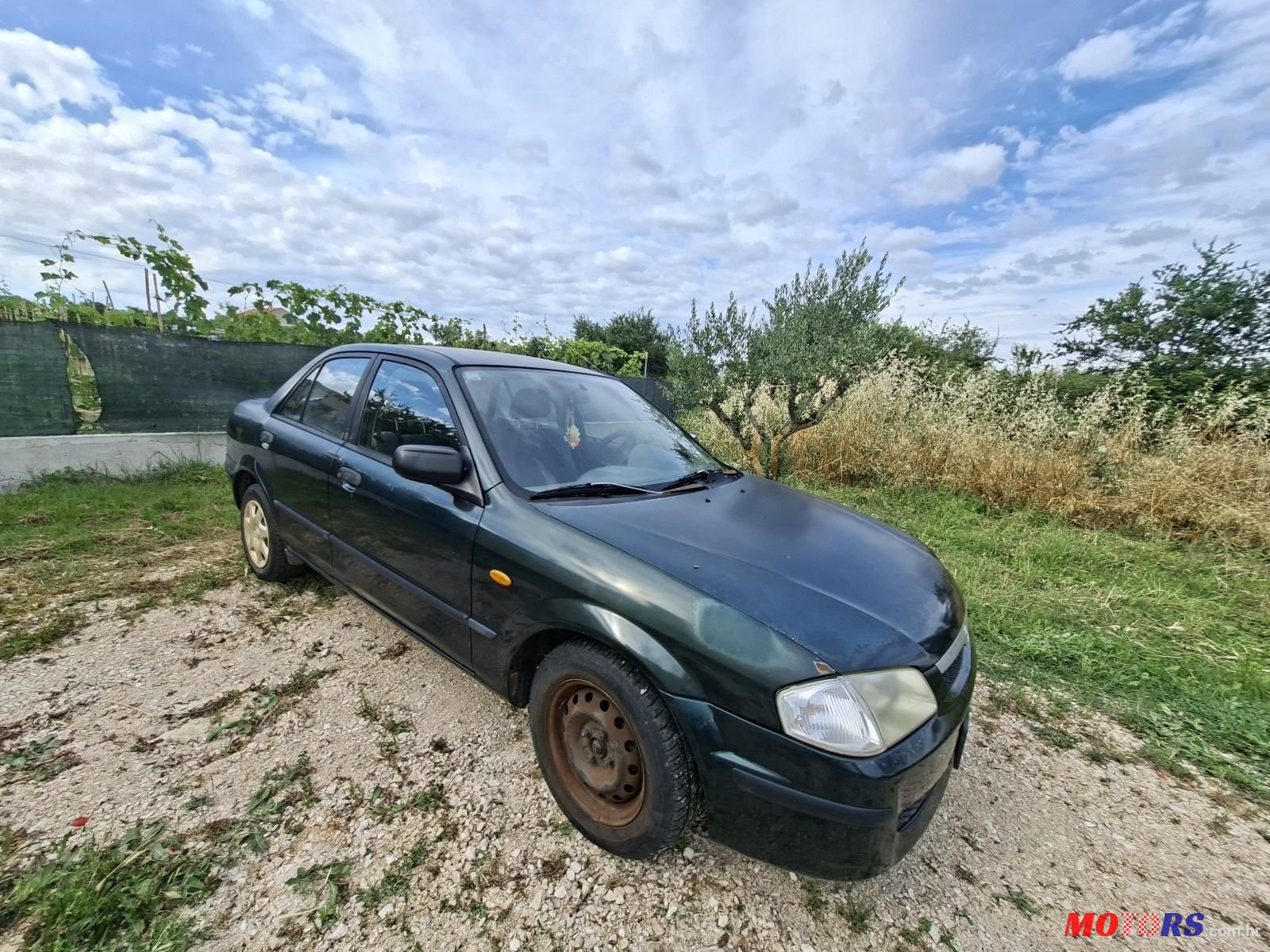 1999' Mazda 323 1.3 Ce 4T photo #3