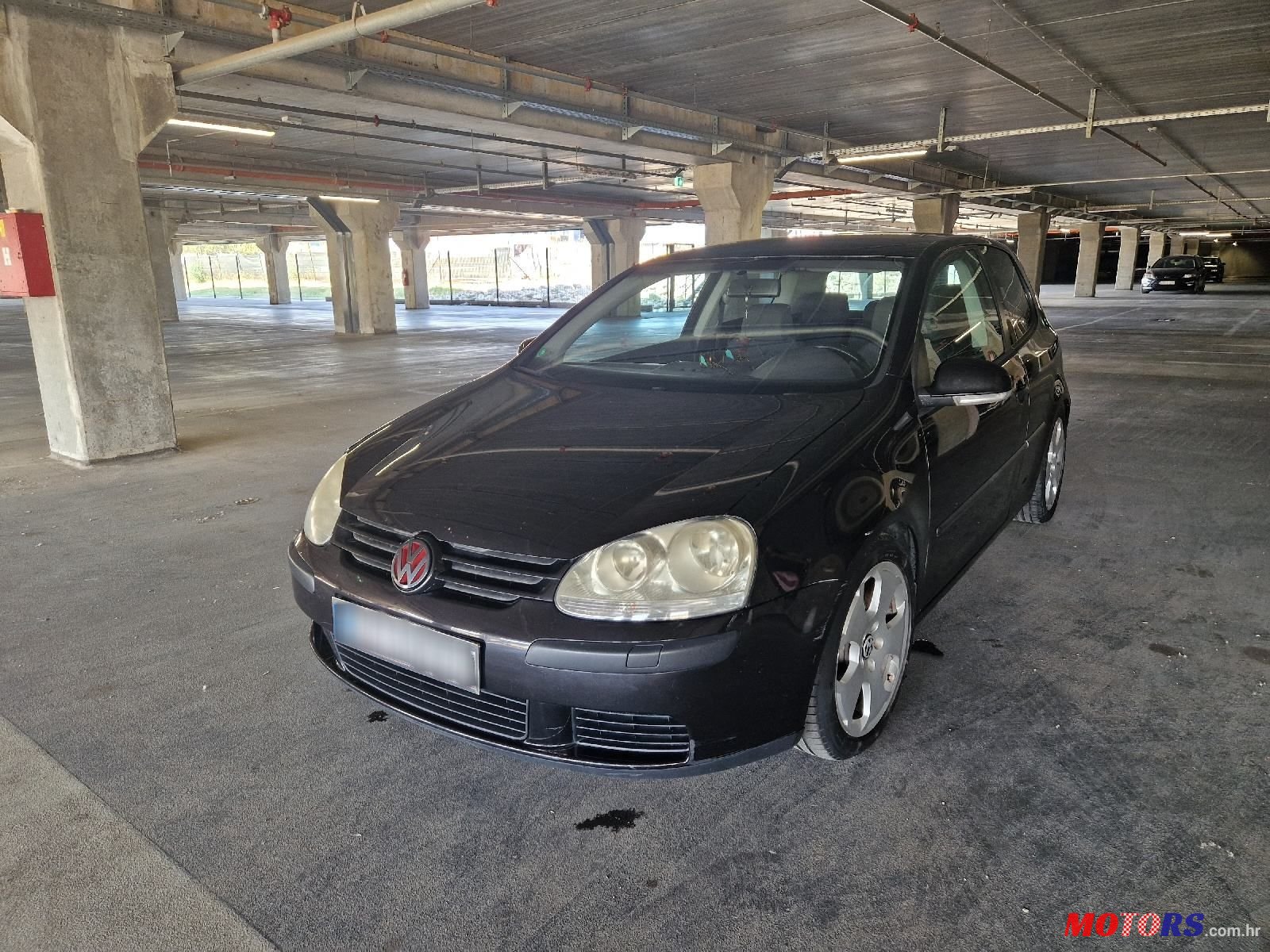 2004' Volkswagen Golf V 1,4 photo #2