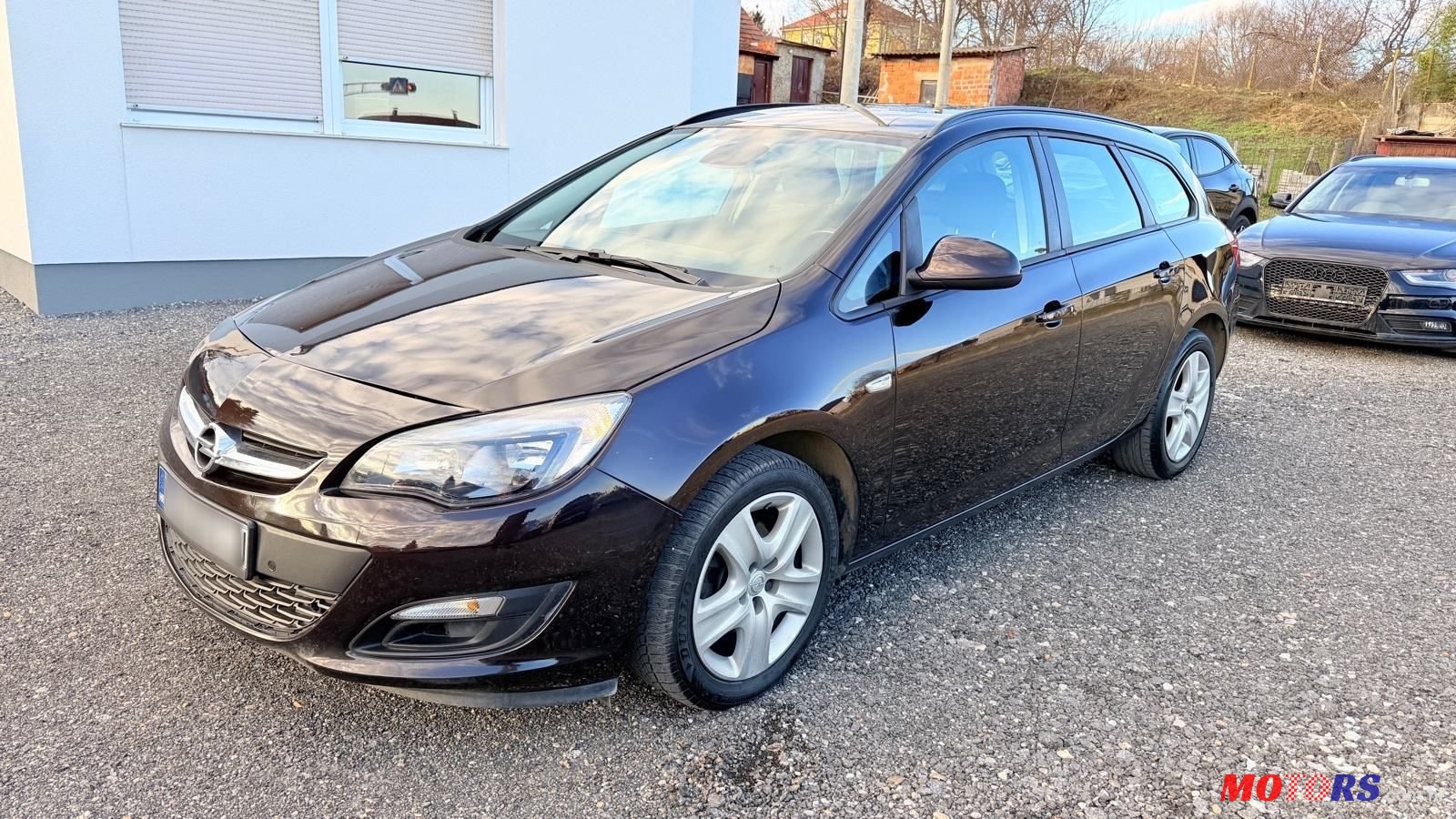 2015' Opel Astra Karavan photo #2