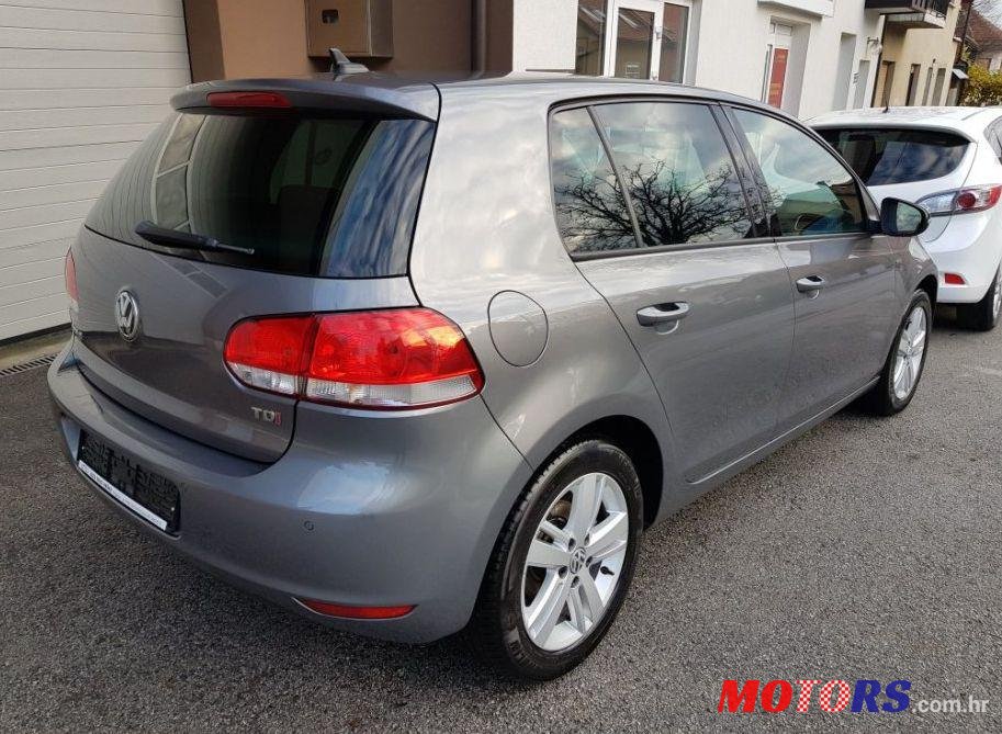 2012' Volkswagen Golf VI 1,6 Tdi photo #2