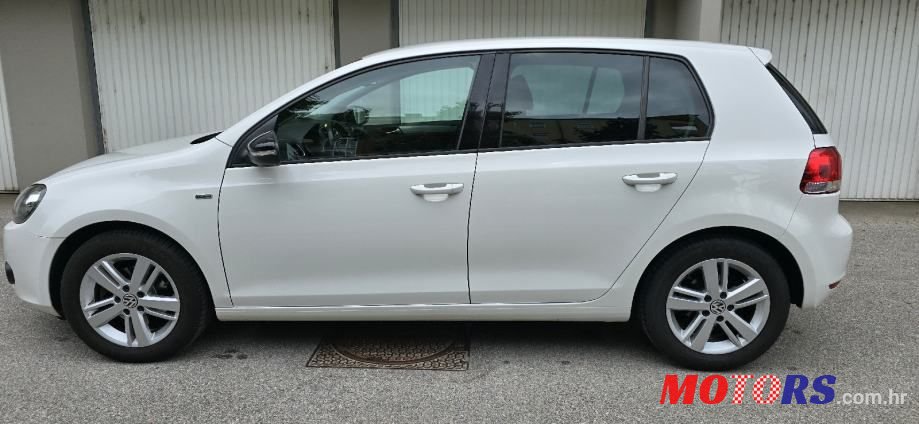 2012' Volkswagen Golf VI 1,6 Tdi photo #6