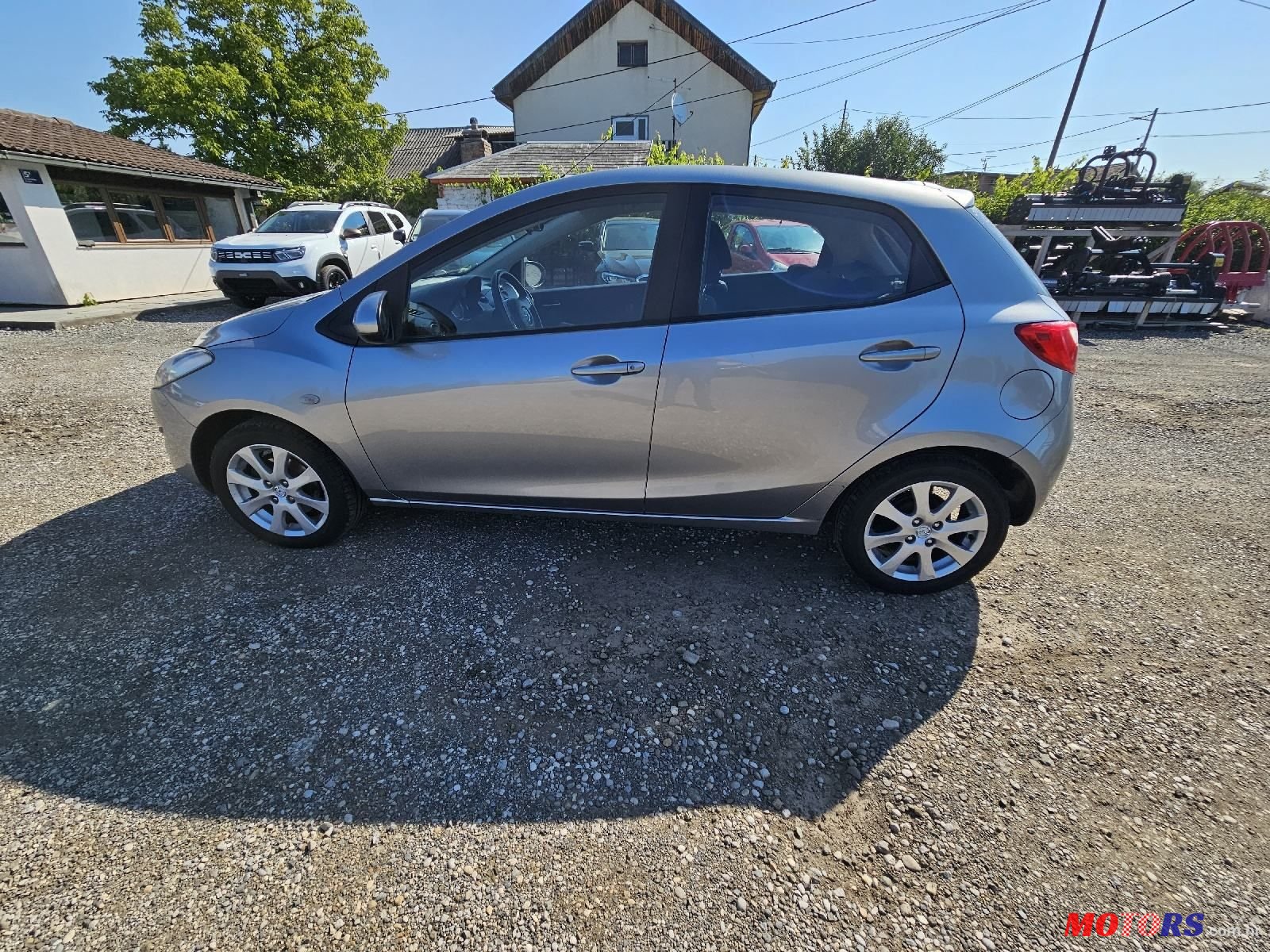 2011' Mazda 2 Sport photo #4
