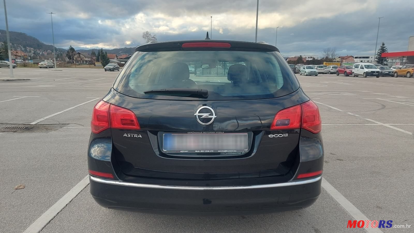 2014' Opel Astra Karavan photo #4