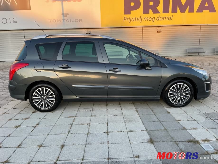 2012' Peugeot 308 Sw photo #5