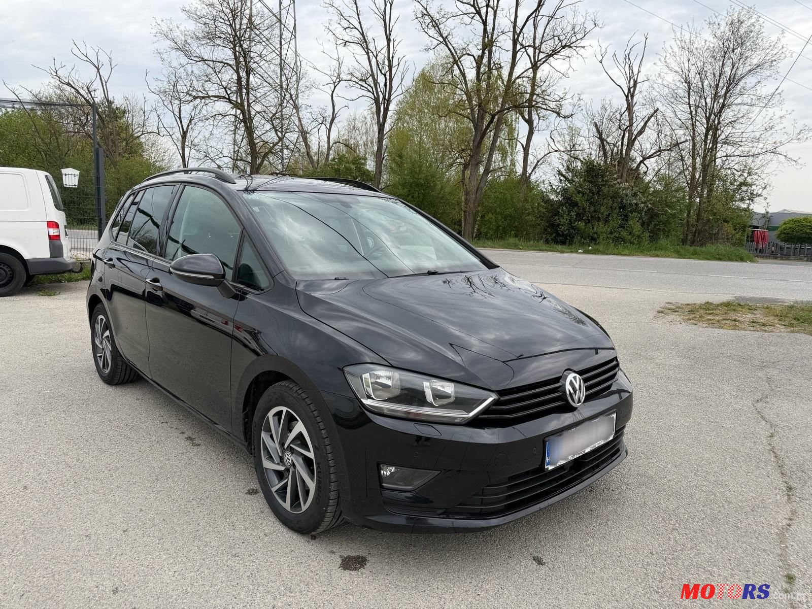 2014' Volkswagen Golf Sportsvan photo #2