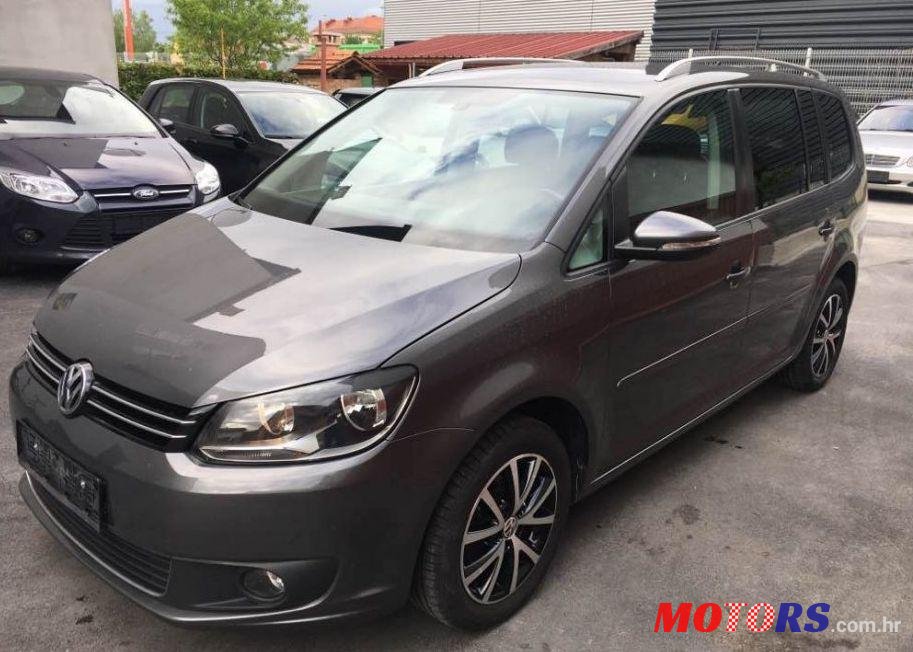 2014' Volkswagen Touran 1,6 Tdi photo #1