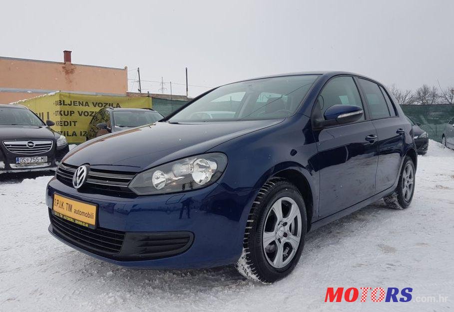 2011' Volkswagen Golf VI 1,6 Tdi photo #1