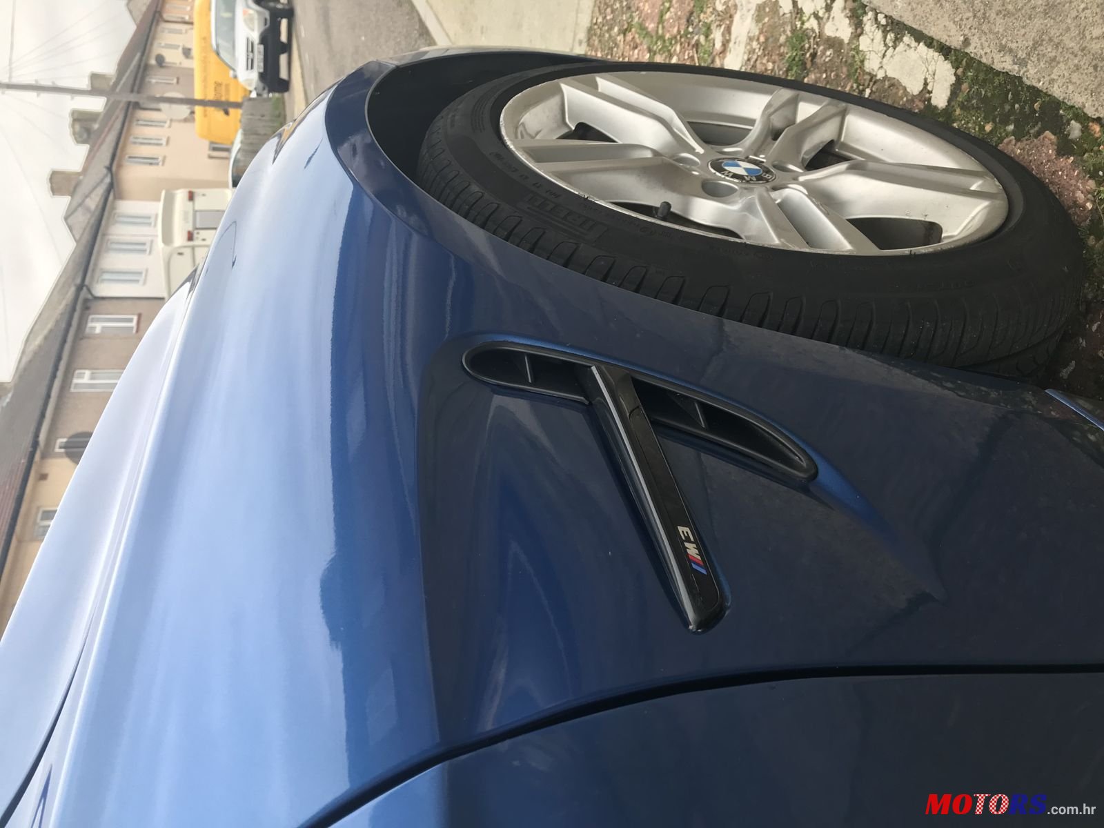 2012' BMW 3 Series M Sport with M3 wings photo #1